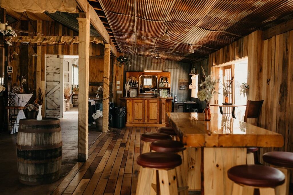 The rustic barn interior at Old Coon Creek Wedding Venue in Beloit, Wisconsin