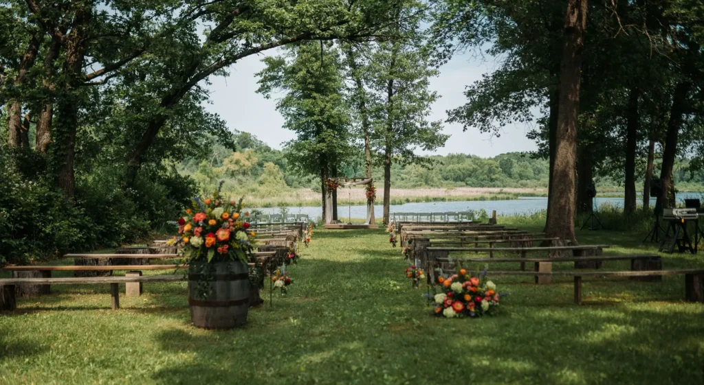The beautiful waterfront view and wedding ceremony space at Old Coon Creek Wedding Venue in Beloit, Wisconsin